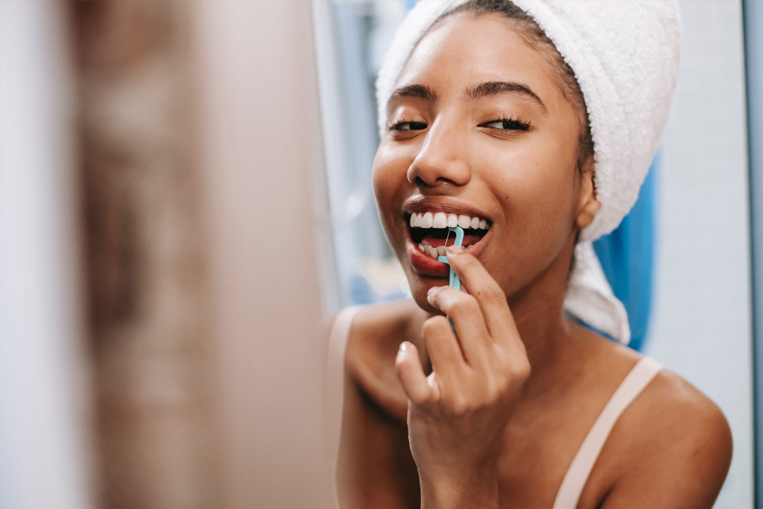 Teeth Whitening Treatment Aftercare - Flossing Teeth