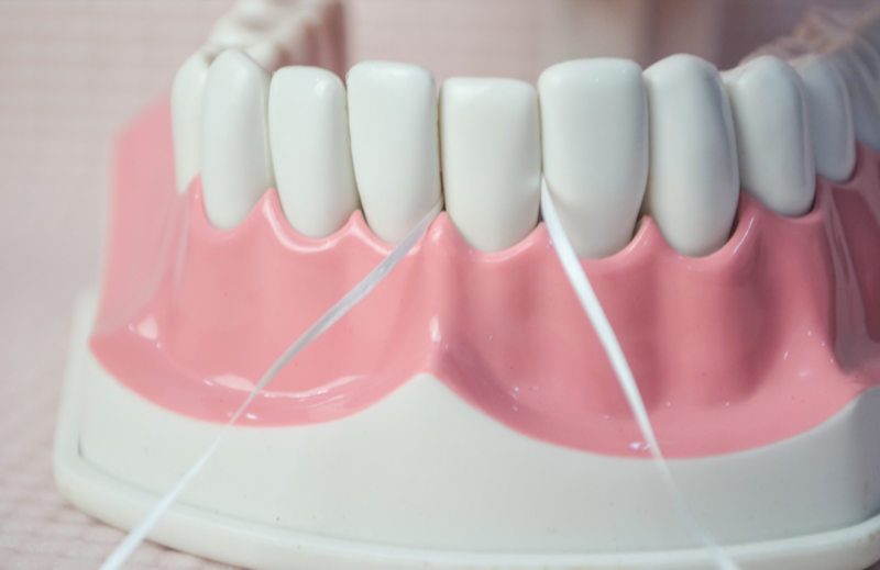 Tips from a Dentist in Roanoke, TX: Take care of your teeth by flossing them