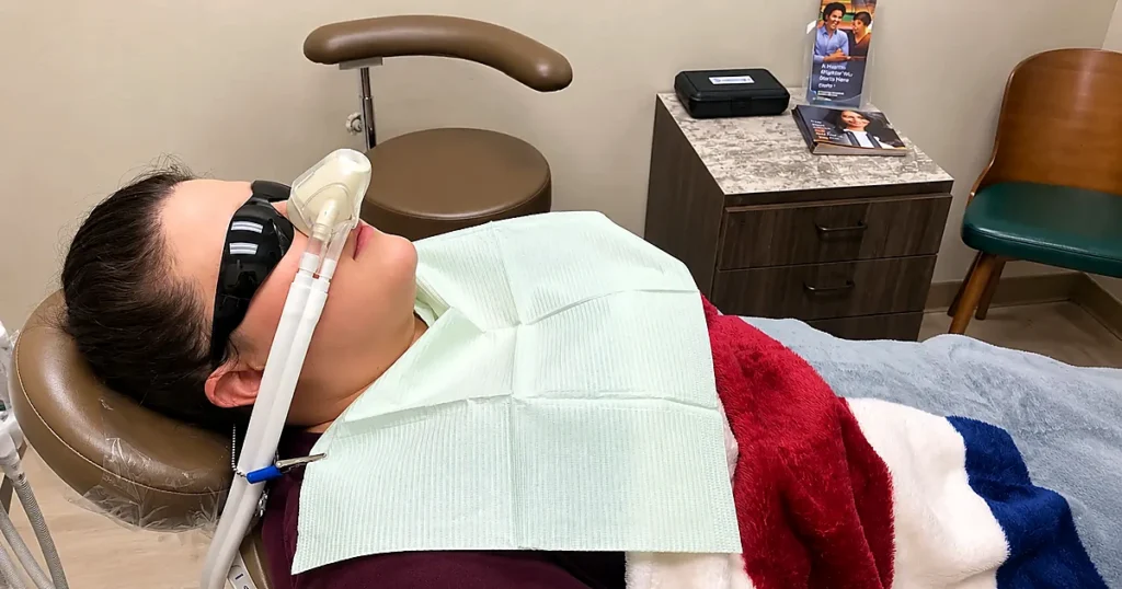 A patient is having anxiety-free dentistry with the help of Dr. Rhea Antolin's treatment procedure
