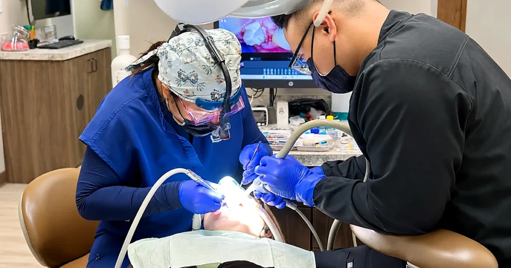 Dr. Rhea Antolin is doing the procedure of tooth extraction on a patient